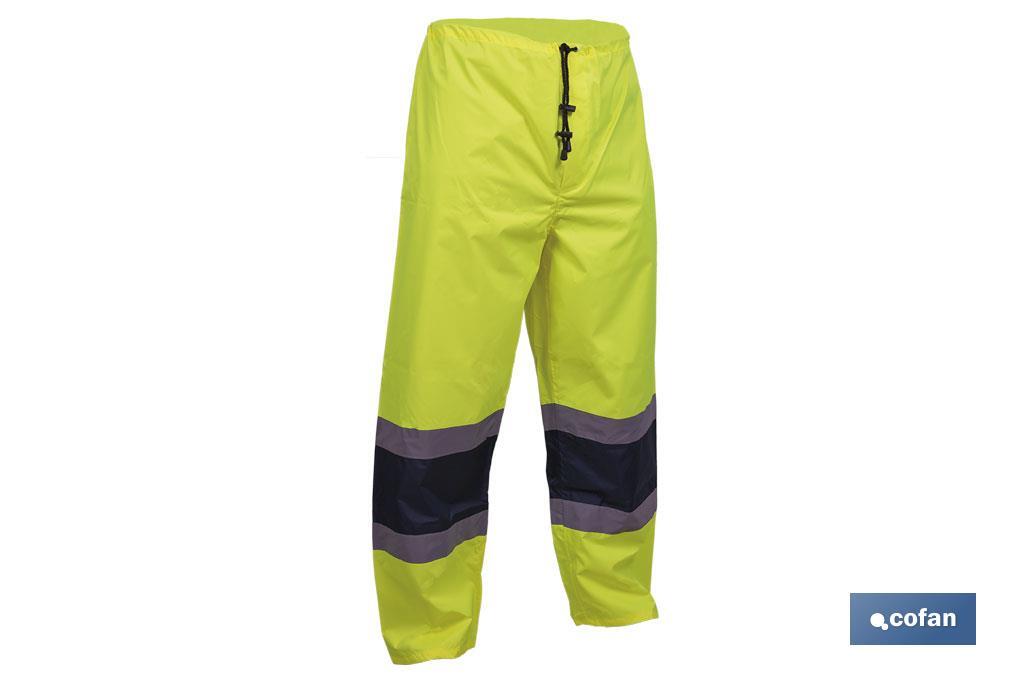 PANTALÓN DE LLUVIA DE ALTA VISIBILIDAD MODELO BELLATRIX AMARILLA Y AZUL TALLA M
